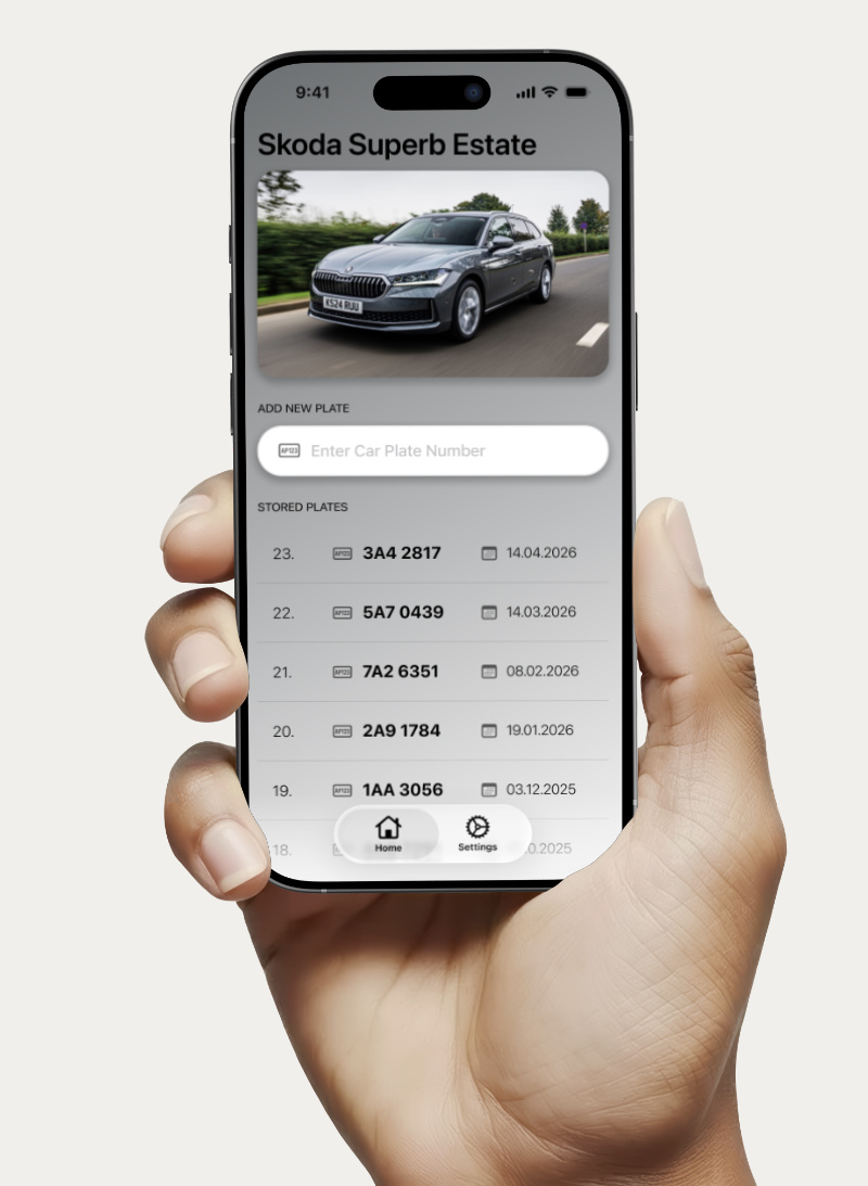 Hand holding iPhone with CarPlates app